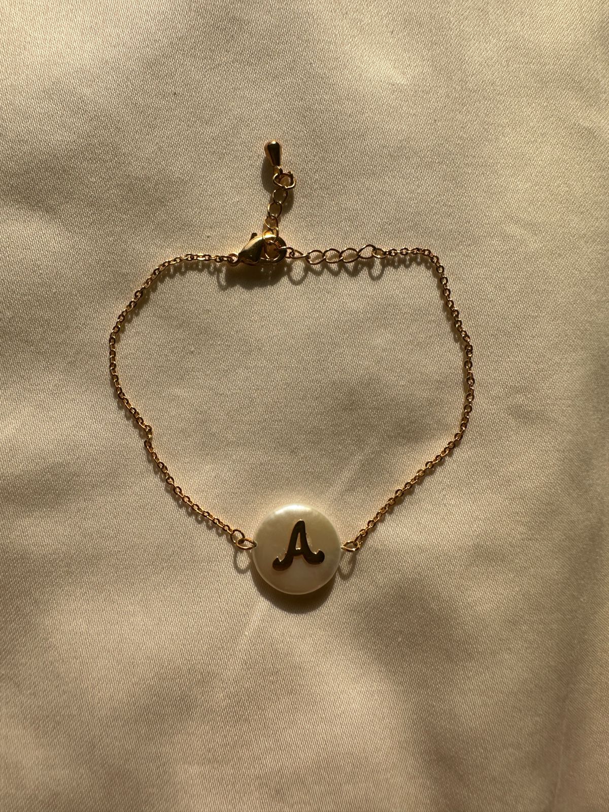 Letter engraved on pearl